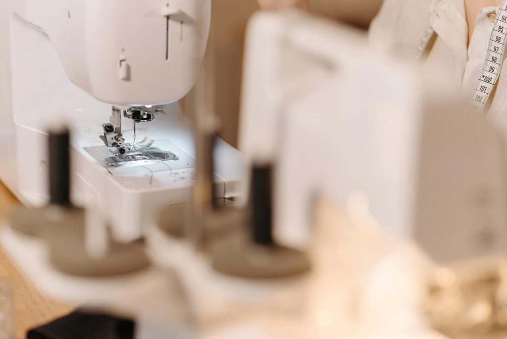 Clothing production with the use of a sewing machine.
